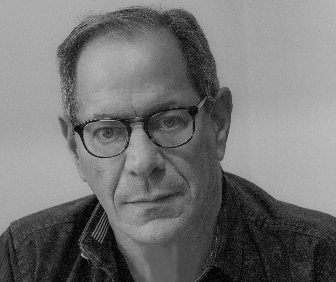 Portrait of Gerry Schweitzer, co-founder & CMO of Simulacra
